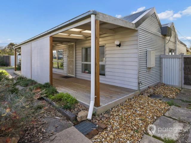 Historic Charm Meets Modern Comfort Renovated 1910 Cottage on Half Acre with a Large Shed