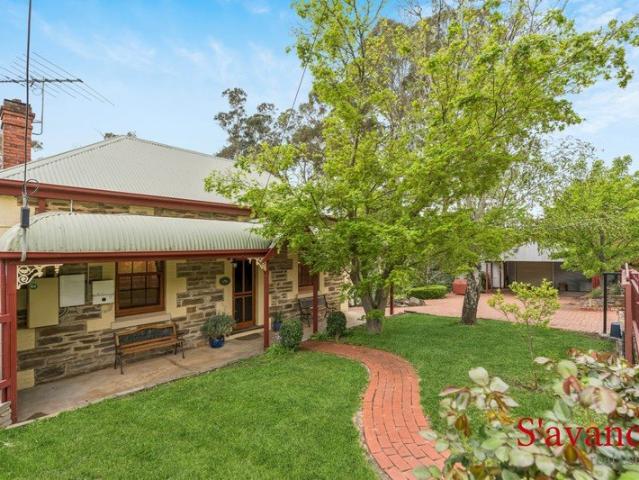 Historic charm meets modern luxury on ½ acre