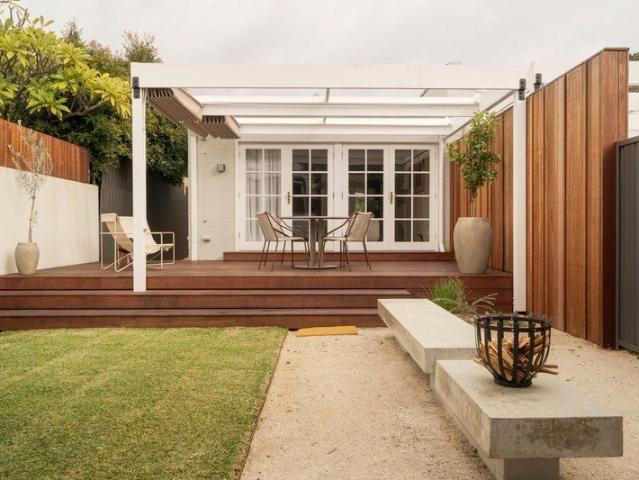 Historic Charm & Modern Comforts On Its Own Green Title