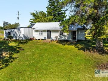 HISTORIC SCHOOLHOUSE WITH ACREAGE!