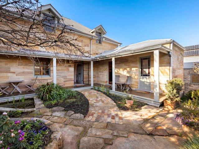 Historic sandstone home with harbour views in prized peninsula setting