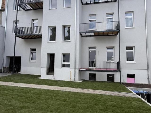 Historischer Charme trifft modernen Wohnkomfort – Dachgeschosswohnung mit Balkon