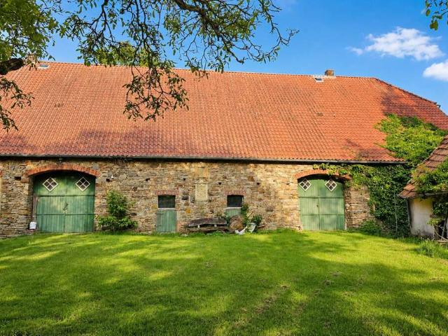 Historisches Gebäude mit zwei Baugrundstücken in BE Wehrendorf!