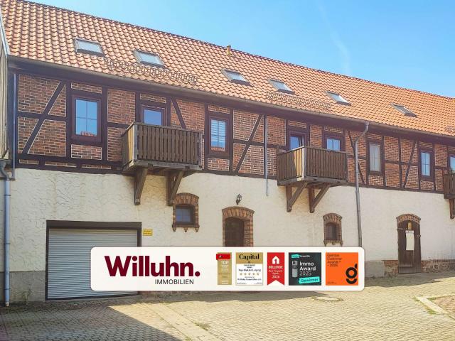 Historisches Erbe trifft Moderne ritterlicher Freihof mit Wohneinheiten, Gewerbe und Photovoltaik