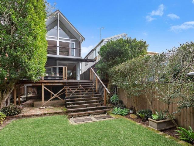 Home of effortless coastal charm with water views
