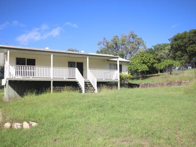 Home on Massive One Acre in Town