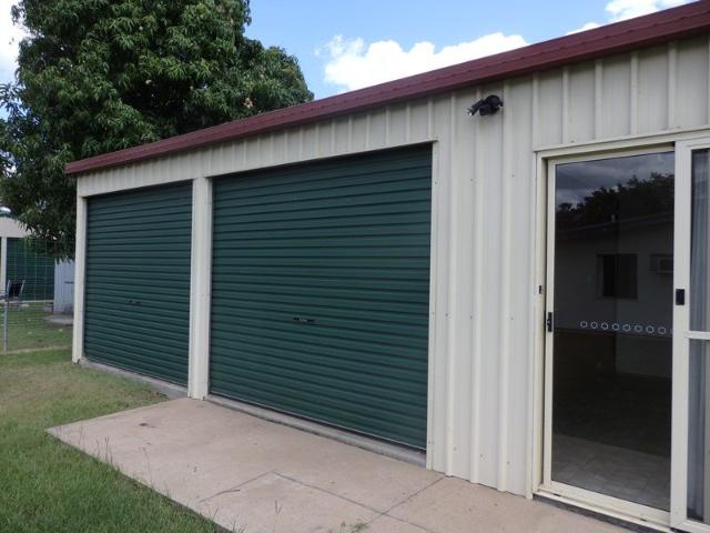 Home on Large block with HUGE shed