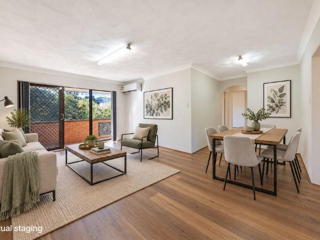 Home Sweet Home! Rare Three Bedroom Apartment with Air Conditioning and Lock Up Garage!