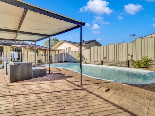 HOME WITH A POOL