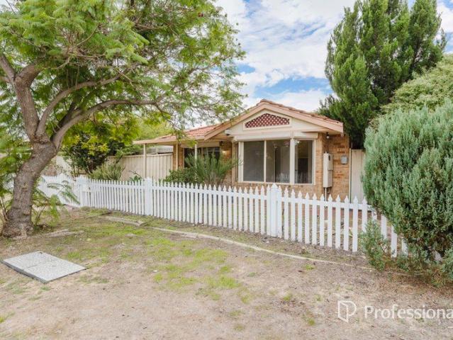 HOME WITH WHITE PICKET FENCE