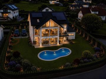 Hochstehende Wohnung zum Verkauf in Mont sur Lausanne in einer Villa mit zwei Wohnungen