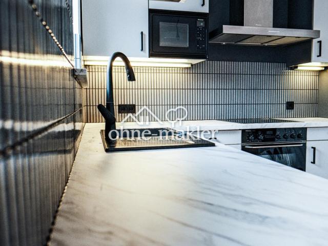 Hochwertig modernisierte 4,5 Zimmer Maisonette mit stilvollem Wohnambiente