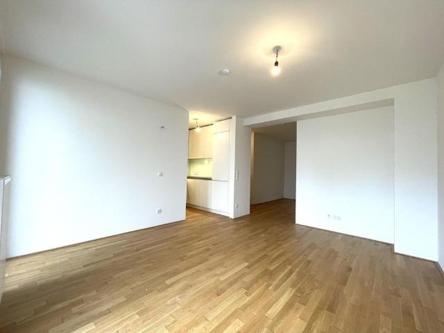 Hochwertig ausgestattete Neubauwohnung mit hofseitigem Balkon!