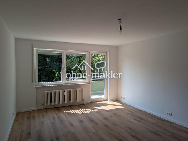 Hochwertig kernsanierte 2 Zi. Gartenwohnung mit Terrasse & großem Garten