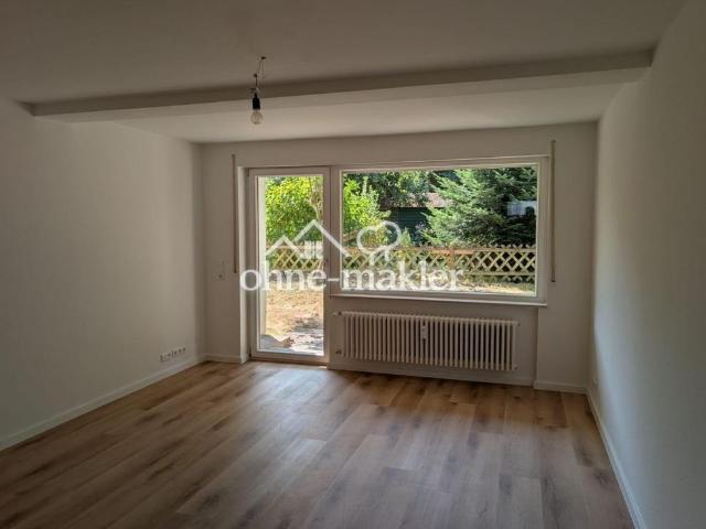 Hochwertig kernsanierte 2 Zi. Gartenwohnung mit Terrasse & großem Garten