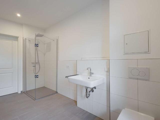 Hochwertig sanierte 3,5 Zimmer Wohnung mit eigenem Stellplatz im Innenhof – WE08