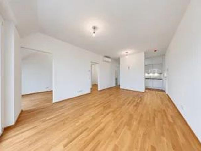 Hochwertige 2 Zimmer Dachgeschosswohnung mit Südloggia und Klimaanlage in Mauer