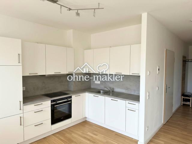 Hochwertige 3 Zi. Erdgeschosswohnung mit EBK, 2 Tageslichtbädern, Terrasse und Gartenanteil