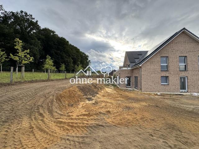 Hochwertige 3 Zimmer Gartenwohnung mit Südterrasse, Designküche & Blick ins Grüne
