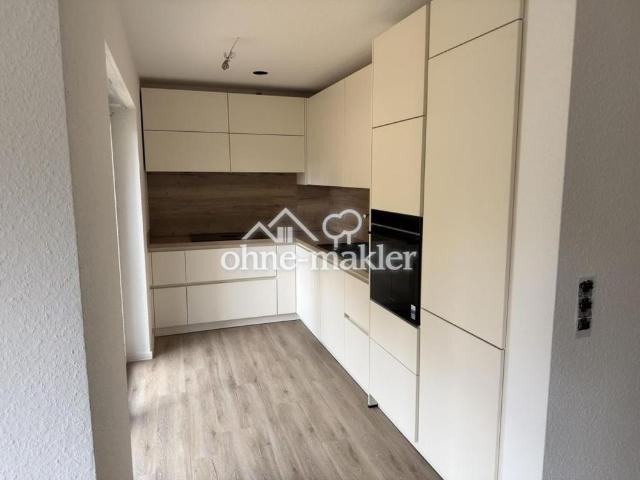 Hochwertige 3 Zimmer Gartenwohnung mit Südterrasse, Designküche & Blick ins Grüne