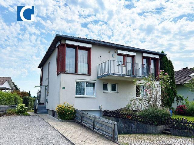Hochwertige 3 Zimmerwohnung mit Gartenanteil