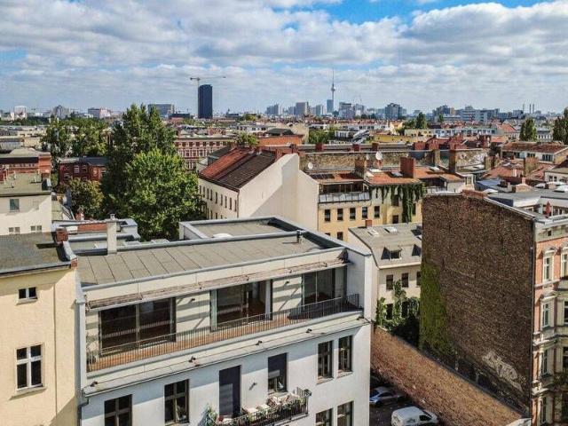 Hochwertige Wohnung mit Parkblick, Kamin und drei Terrassen