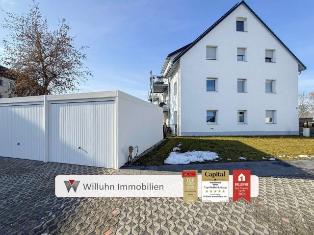 Hochwertige Ausstattung mit Tageslichtbad, Balkon, Stellplatz und Garage