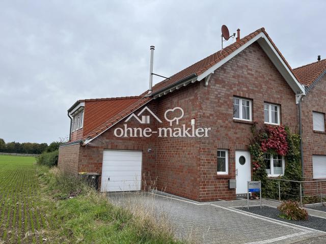 Hochwertige Doppelhaushälfte mit großem Grundstück, Garage & Ausbaupotenzial in attraktiver Lage