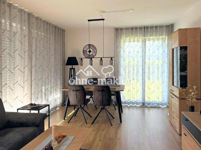 Hochwertige moderne 2 Zimmer Wohnung mit Terrasse und Gartenanteil
