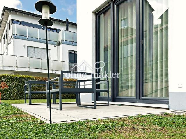 Hochwertige moderne 2 Zimmer Wohnung mit Terrasse und Gartenanteil