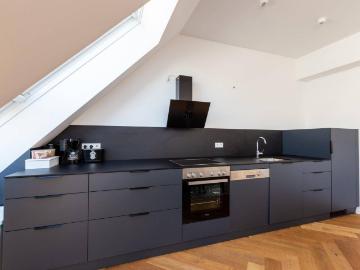 Hochwertiges Edelinvestment Vermietetes Dachappartment Ruhelage
