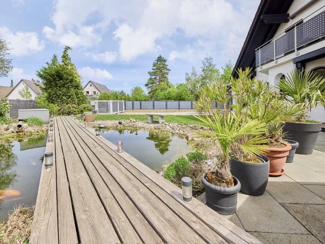 Hochwertiges Einfamilienhaus mit Garten und Wellnesslandschaft in Graben