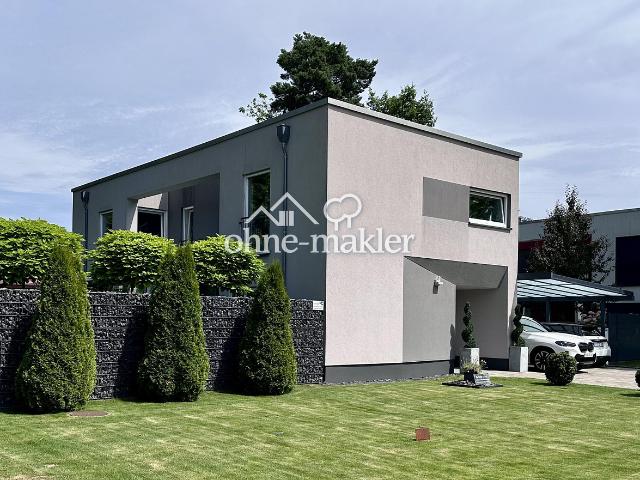 Hochwertiges Einfamilienhaus in massiver Bauweise mit moderner Energietechnik und stilvollem Garten