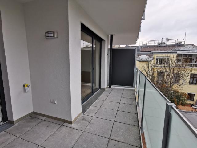 Hofseitig ausgerichtetes Zuhause mit Balkon