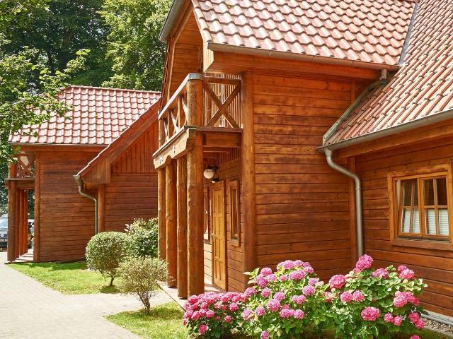 Holz trifft Hochufer: 4 strandnahe Wohneinheiten Meeresrauschen gratis!