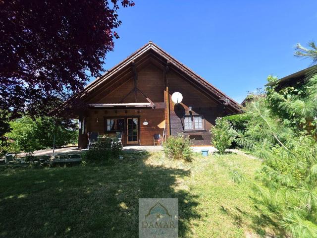 Holzhaus mit Garten & Seezugang – Wohnen, wo andere Urlaub machen!