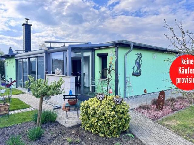 HORN IMMOBILIEN + Einfamilienhaus mit Wintergarten, Kamin und Gästehaus in Krugsdorf bei Pasewalk