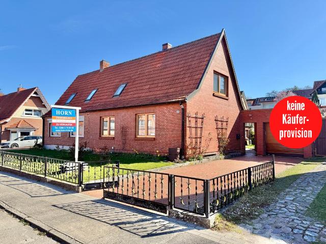 HORN IMMOBILIEN+ Neubrandenburg, Doppelhaushälfte mit Keller, Garage und Nebengelass