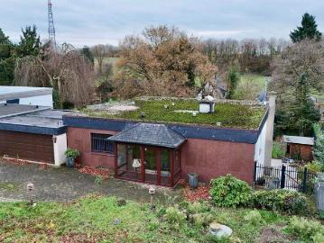 Höseler Hanglage trifft Gestaltungsfreiraum Bungalow mit Zukunft
