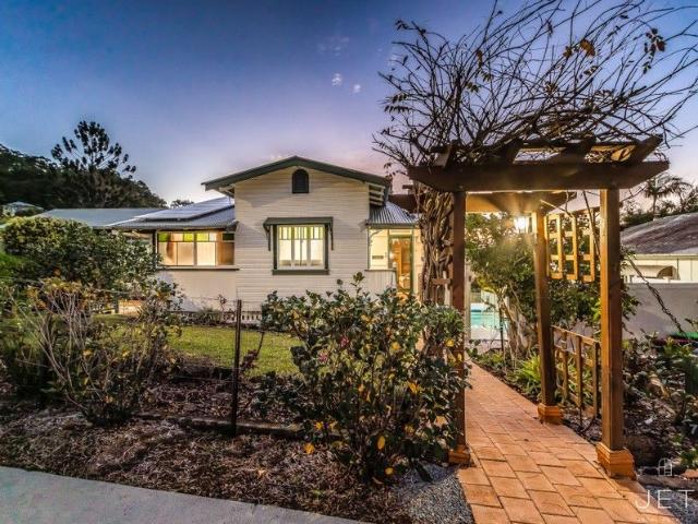Elevated 1928 Residence on Prestigious Hospital Hill