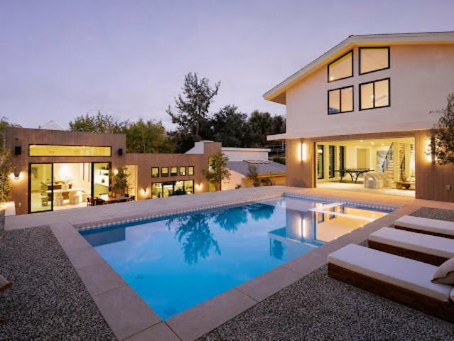 Contemporary house with pool and garden