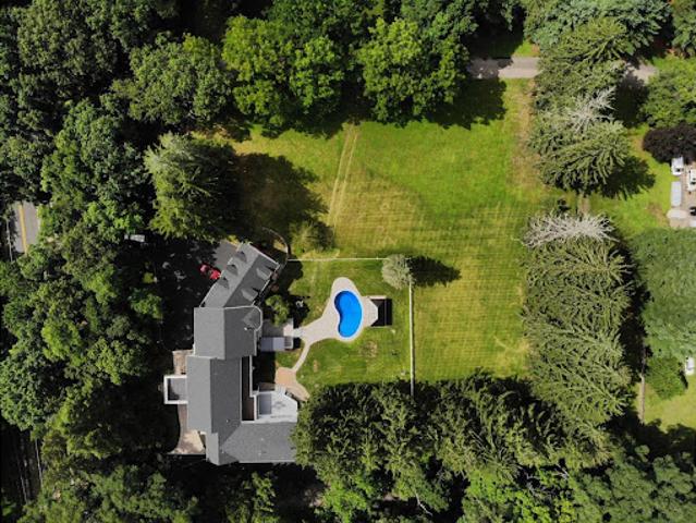 Contemporary house with pool and garden