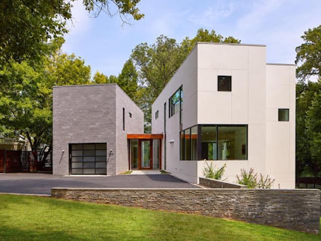 Contemporary house with pool and garden
