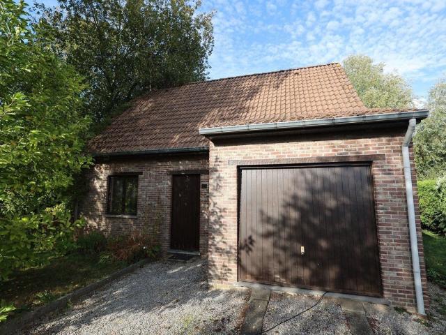 3 bedroom house with a garage and a yard