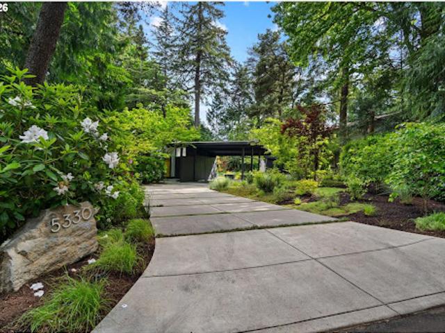 Contemporary house with pool and garden
