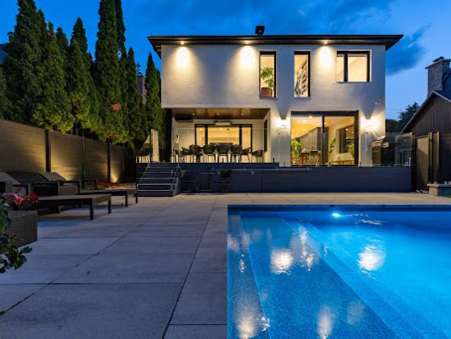Contemporary house with pool and garden