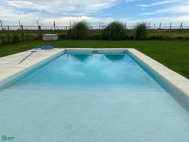 HOUSE WITH LANDSCAPED POOL