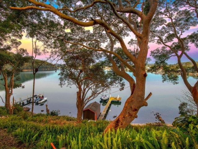 House with Private Jetty, Boat House with back yard that backs onto bush land