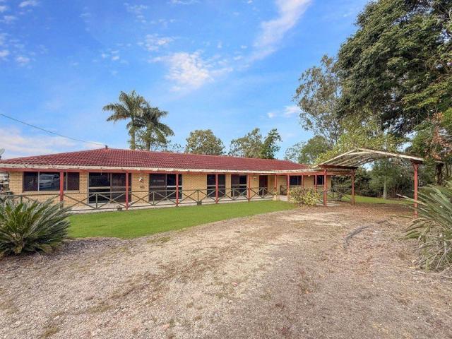 HOUSE AND HUGE SHED WITH LOADING RAMP