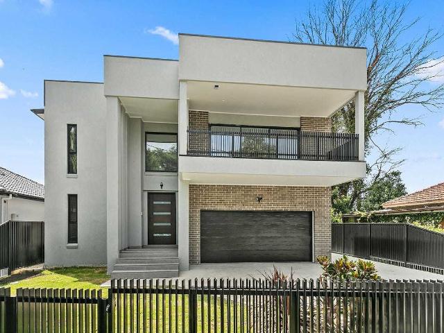 house at 231 Henry Lawson Drive, Georges Hall NSW 2198
